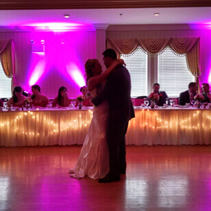 bride and groom dancing