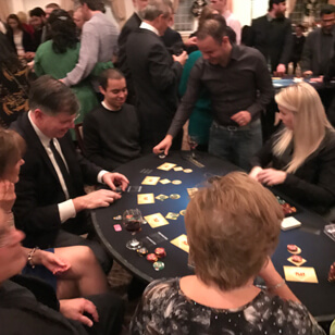 people playing a casino game